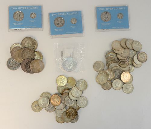 12 Silver Dollars; 47 silver 1/2 dollars; 1 silver Eagle; 3 silver dimes; 28 silver clad.