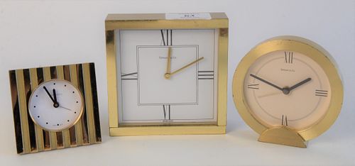 Three Piece Lot of Tiffany & Company Desk Clocks, each brass, tallest height 4 inches.