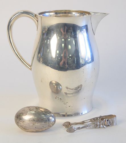 Sterling Silver Group to include Silver Pitcher, pair of tongs and Cartier sterling silver weighted egg paperweight 25.1 Toz weighable.