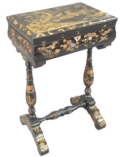 Lacquered Sewing Table having hinged lid top painted trees and birds opening to fitted interior, height 27 inches, top 12 1/4" x 18 1/2".