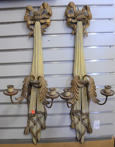 Pair of French Gilt Metal and Carved Painted Wood Two Light Sconces, in the form of a drape with curtain ties, height 32 inches.