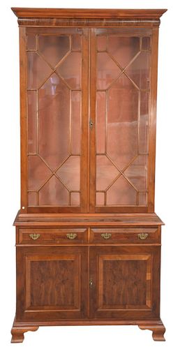 Two-Part Cabinet, with glass shelves, burlwood, on ogee feet, height 83 inches, width 38 inches.