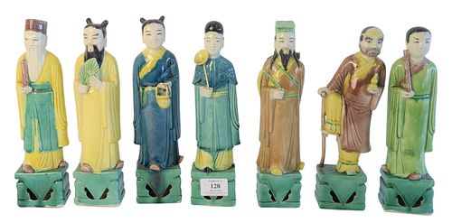 Seven Chinese Figural Porcelain Sculptures, each marked indistinctly on the underside, height of each 10 1/4 inches.