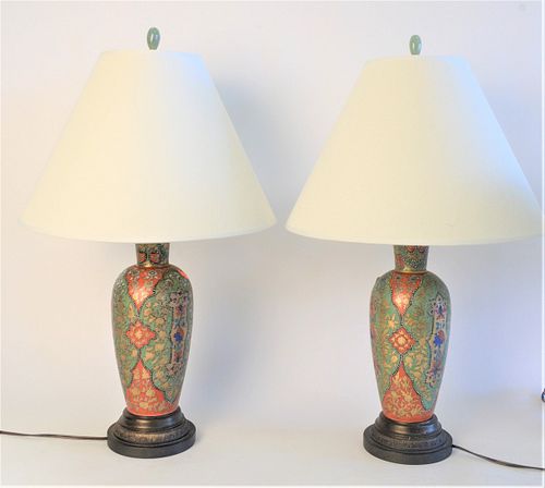 Pair of Porcelain Vases Turned into Lamps, and enameled in a Persian motif with jewel tones, height 25 inches.