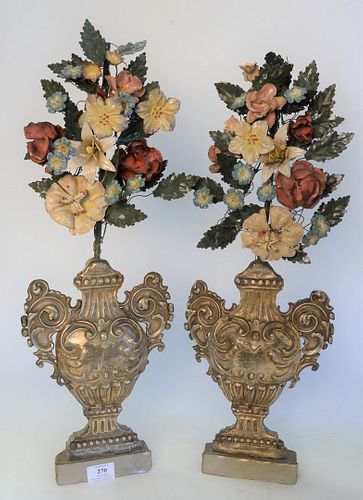 Pair of Baroque Mantle Garnitures, having embossed tin urn with metal painted flowers, height 24 inches.