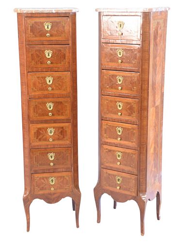 Pair of Louis XV style marble top Semainiers with 7 drawers, France, circa 1900, height 51-1/2 inches, width 14 inches, depth 19 1/4 inches.