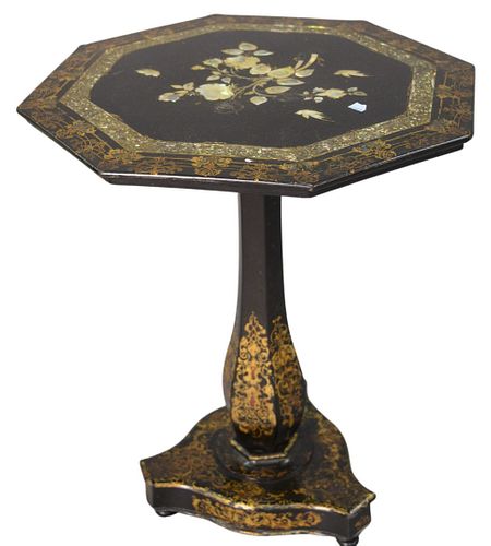 Victorian Paper Mache and Black Laquered Table, having mother of pearl inlay and gilt decoration, height 24 3/4 inches, diameter 21 inches.