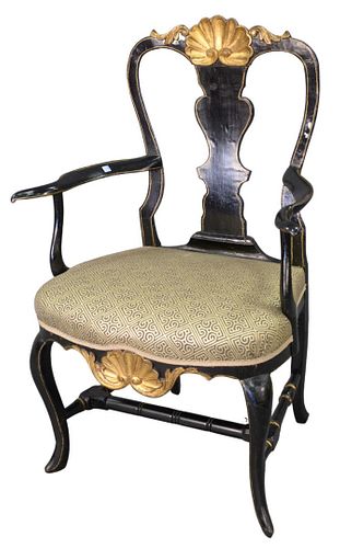 Queen Anne Armchair, with shell carved crest rail over vasiform back, over upholstered seat with shell carved front skirt, raised on cabriole legs wit