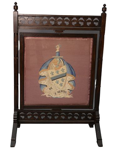 Victorian Oak Fire Screen, with revolving needlepoint panel, height 46 inches, width 30 inches.