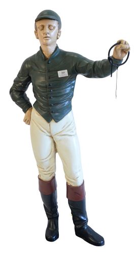 Cast Iron painted Hitching post, modelled as a jockey, height 48 inches, purchased from Christie's, South Kensington, September 27, 2000.