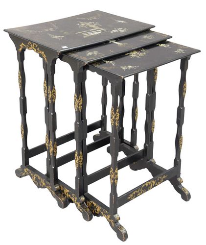 Nest of Three Victorian Black Lacquered Stacking Tables, having mother of pearl inlay and gilt decoration, height of tallest 27 1/2 inches.