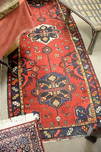 Three Oriental Throw Rugs, 2' 4" x 4' 8"; 3' 6" x 8' 9"; 3' 2" x 4' 3". Provenance: From the Robert Circiello Collection, West Hartford, Connecticut.