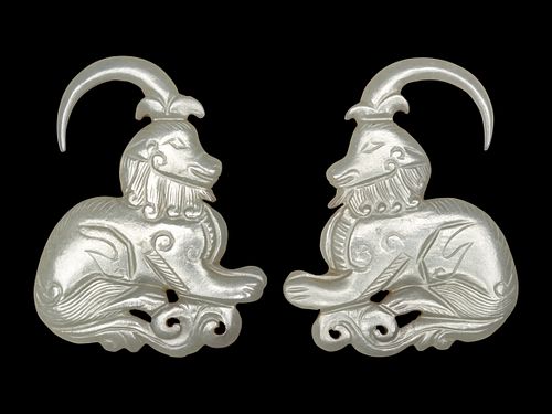 A Pair of Greyish Celadon Jade 'Ram' Earrings