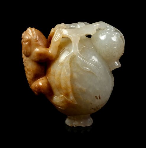 A White and Russet Jade Group of a Frog on a Pomegranate