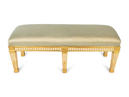 A Directoire Style Painted and Parcel Gilt Bench 19TH/20TH CENTURY with a pale green silk upholstered seat.ches.