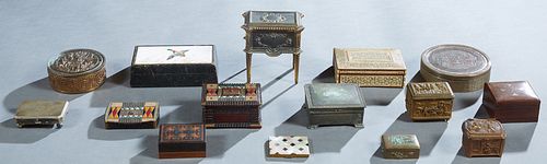 Group of Fifteen Items, early 20th c., consisting of two circular metal boxes; a leather wood lined box , the lid with a Boehm porcelain plaque of a d