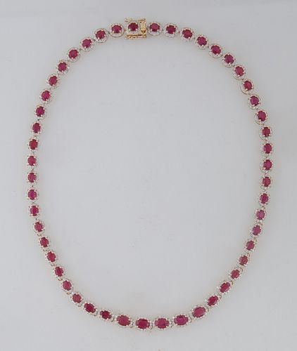 14K Yellow Gold Link Necklace, each of the fifty links with a graduated oval ruby atop a border of round diamonds, total ruby wt.- 27.54 cts., total d