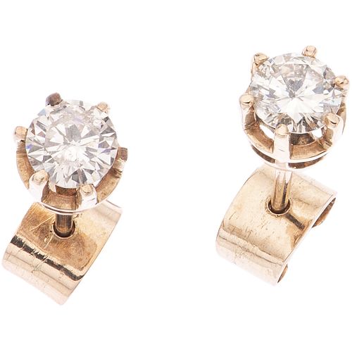 PAIR OF STUD EARRINGS WITH DIAMONDS, 10K PINK GOLD 2 Brilliant cut diamonds ~1.0 ct. Clarity: SI2-I2. Color: J