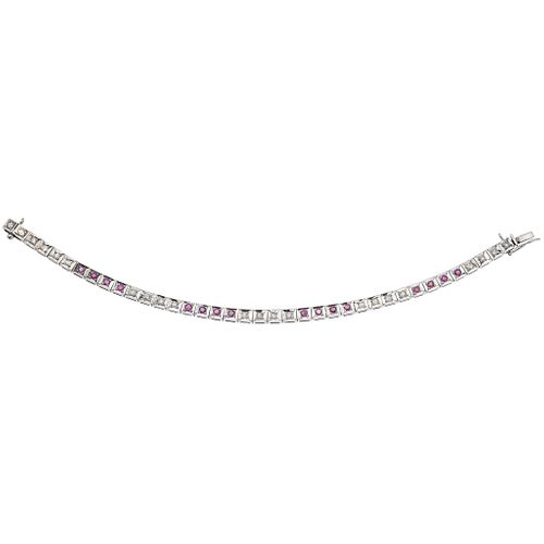 BRACELET WITH RUBIES AND DIAMONDS IN PALLADIUM SILVER 16 Round cut rubies ~1.28 ct, 20 8x8 and brillante cut diamonds ~0.80 ct