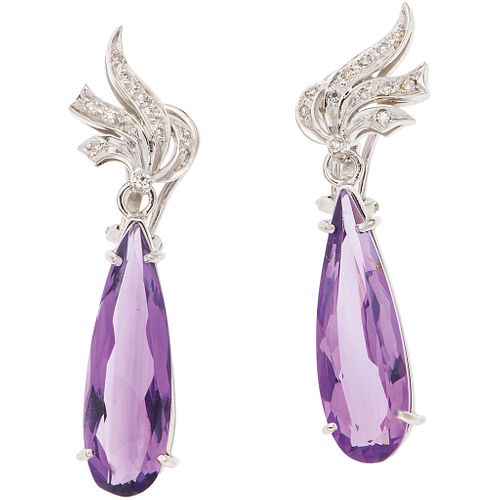 PAIR OF EARRINGS WITH AMETHYSTS AND DIAMONDS IN PALLADIUM SILVER 2 Pear cut amethysts, 24 8x8 cut diamonds ~0.16 ct. Weight: 9.0 g
