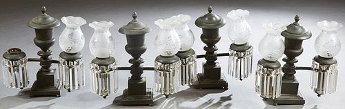 Set of Four Patinated Bronze Double Arm Argand Lamps, 19th c., fitted with seven frosted etched glass shades and square button and triangular prisms, 