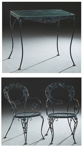 Three Piece Wrought Iron Glass Top Dining Set, 20th/21st c., consisting of a glass top bistro table with floral and scroll decoration, together with t