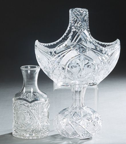 Group of Three Pieces of Cut Crystal, 20th c., consisting of two carafes, and a large handled basket, Basket- H.- 11 in., W.- 11 3/4 in., D.- 8 in. (3