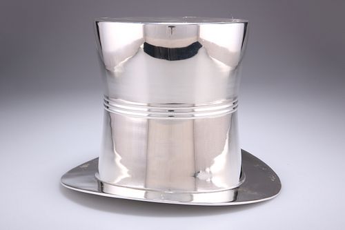 A SILVER-PLATED NOVELTY ICE BUCKET, in the form of a top ha