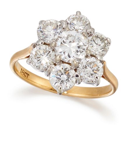 A DIAMOND CLUSTER RING, a round brilliant-cut diamond in a 
