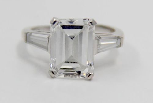 JEWELRY. 4 Carat Emerald Cut Diamond Ring.
