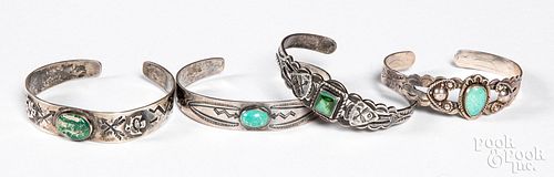 Four Native American silver & turquoise bracelets