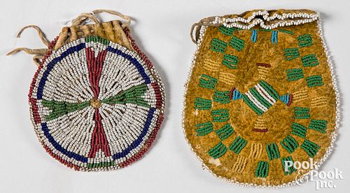 Two small Plains Indian beaded hide pouches