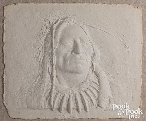 Les Hawks molded paper depiction of a Indian Chief