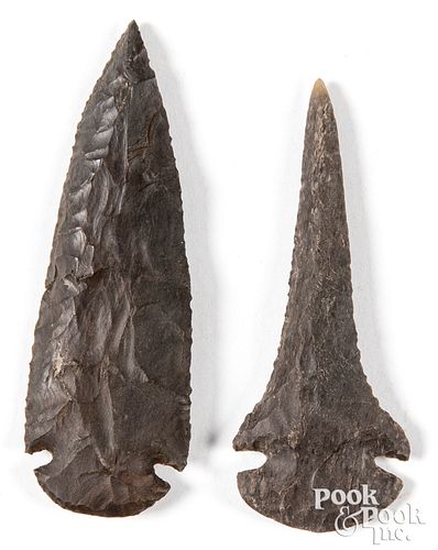 Two black chert items, to include a dovetail point