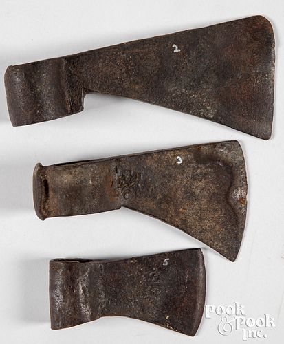 Three iron trade axe heads