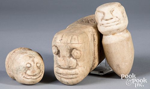 Three effigy style axe heads