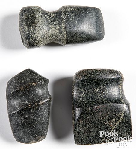 Three highly polished granite axe heads