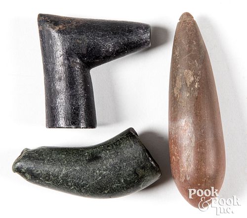 Three stone artifacts, to include two pipe bowls