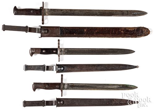 Two US Krag bayonets and scabbards