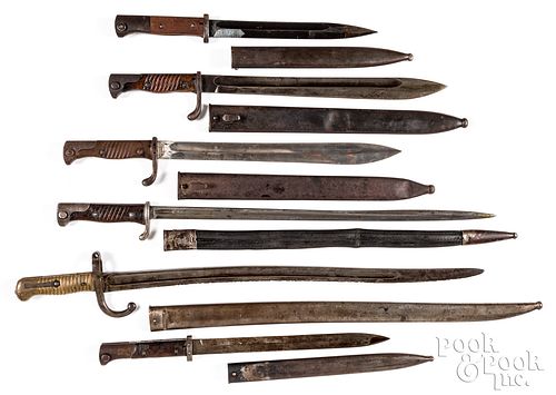 Six bayonets and scabbards