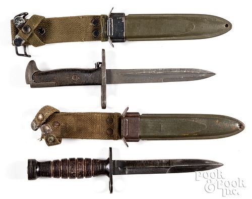 Two WWII US bayonet/fighting knife and scabbard
