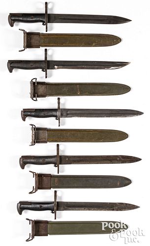 Five WWII M1 Garand bayonets and scabbards