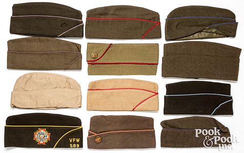 Eleven US garrison caps, together with a VFW cap