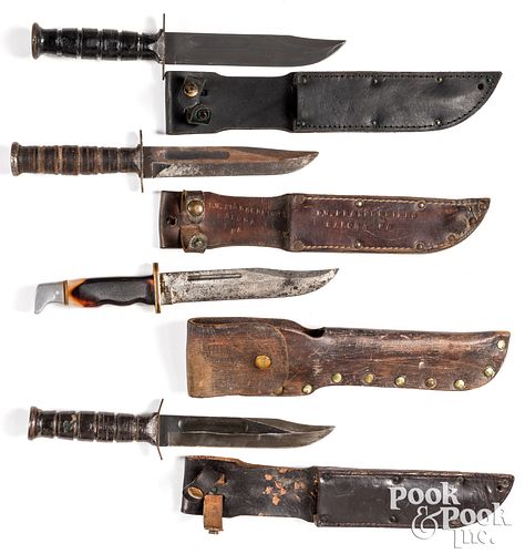 Four fighting knives in sheath