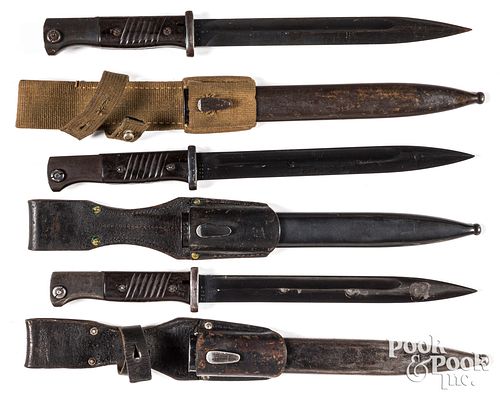 Three WWII K98 bayonets, scabbard and frog