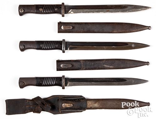 Three WWII German K98 bayonets and scabbards