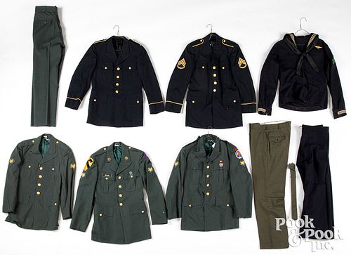 Three Vietnam era US Army military uniforms