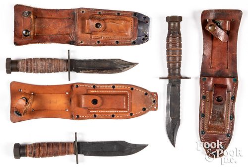 Three pilot's survival knives with sheaths