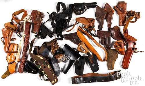 Group of leather holsters and gun belts