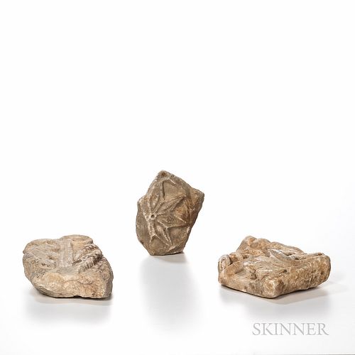 Three Carved Stone Fragments